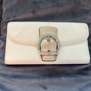 White leather buckle coach wallet